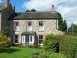 An attractive double fronted cottage with garage with